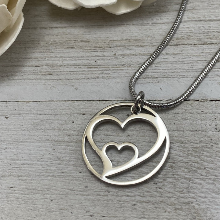 Hearts Embrace Pendant, large or petite - Be Inspired UP