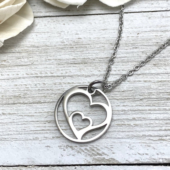 Hearts Embrace Pendant, large or petite - Be Inspired UP